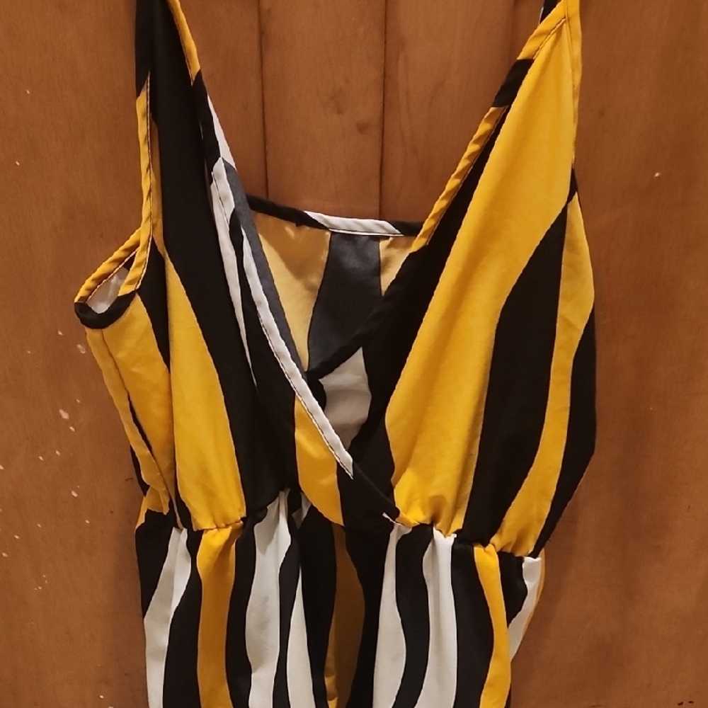Bold Yellow and Black Striped Romper with Plunging V-Neckline